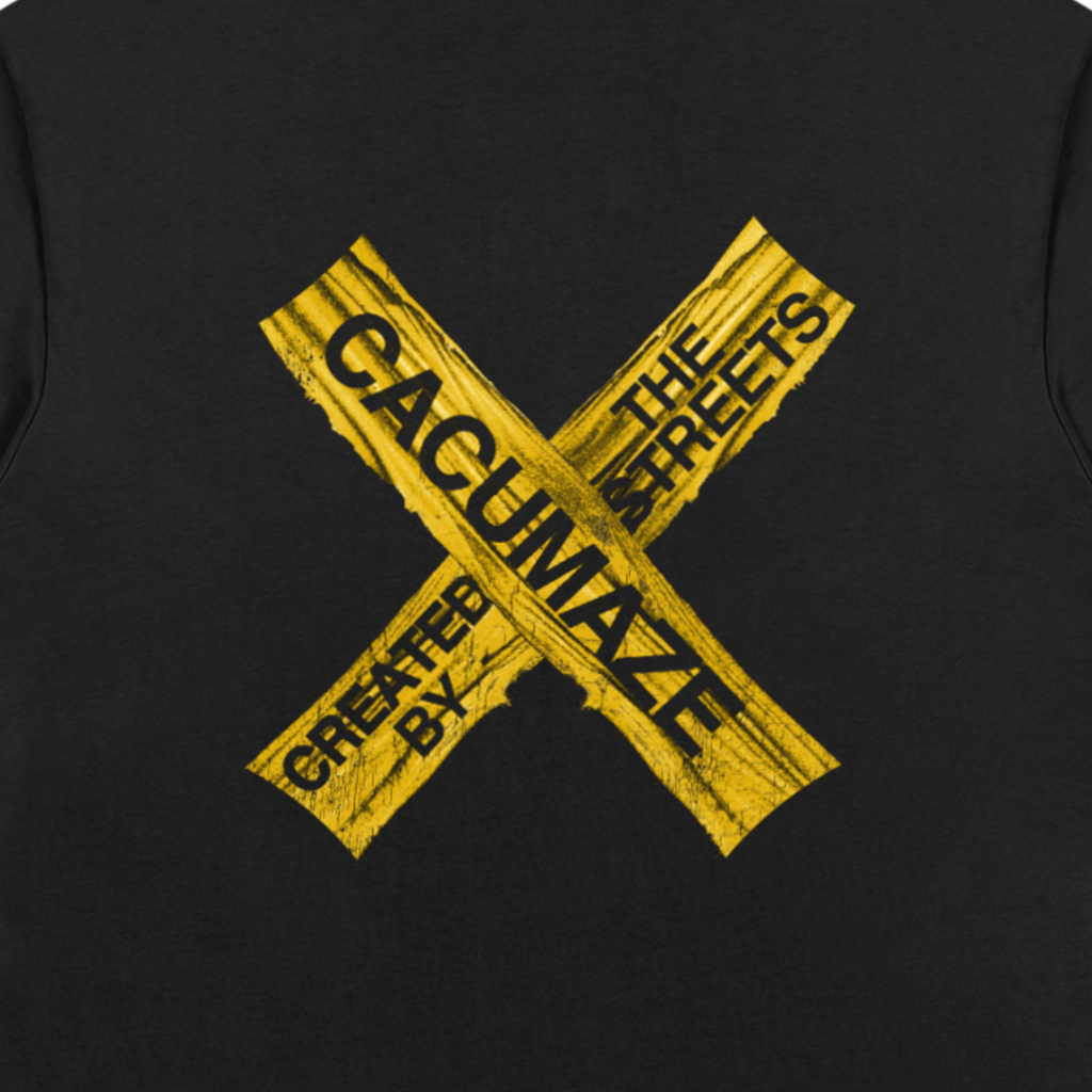 Black tshirt with a graphic of yellow croaa and and 'CMZE' branding.