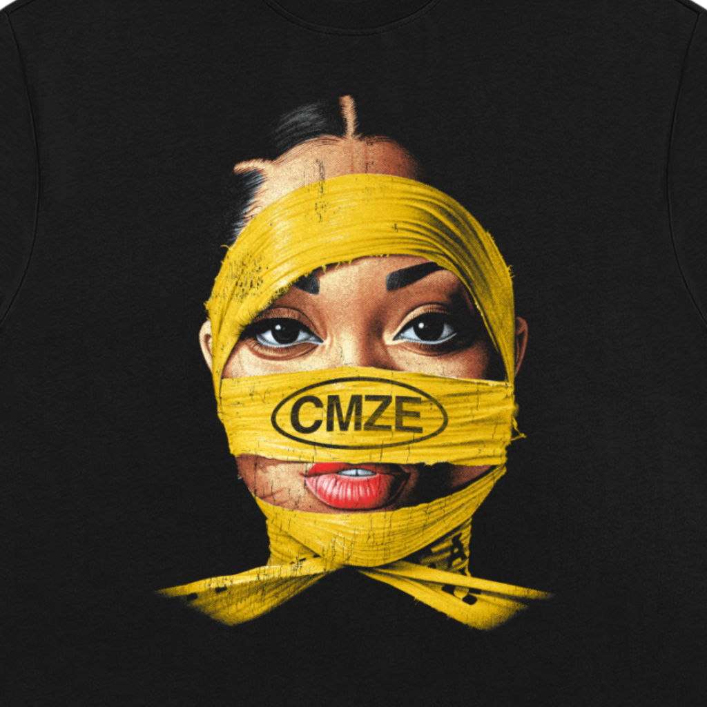 Black heavyweight tshirt with a graphic of a person with yellow wrap and 'CMZE' branding.